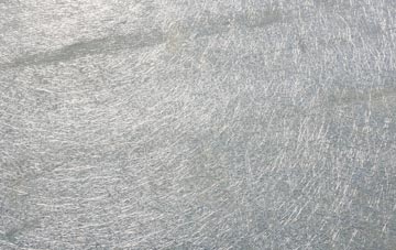 Lettan laminate fibreglass or shingles?